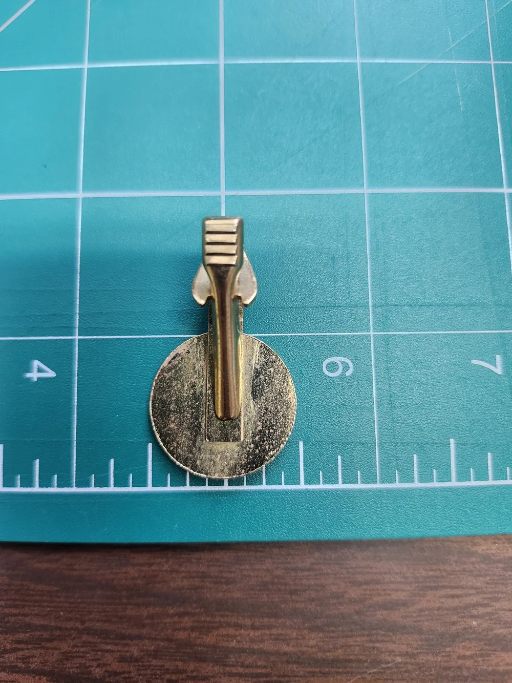 Usher Gold and White Enamel Logo Brooch Tie Clip